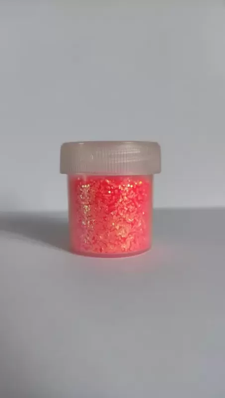 Блискітка коралова-райдужна UV 0.6 мм